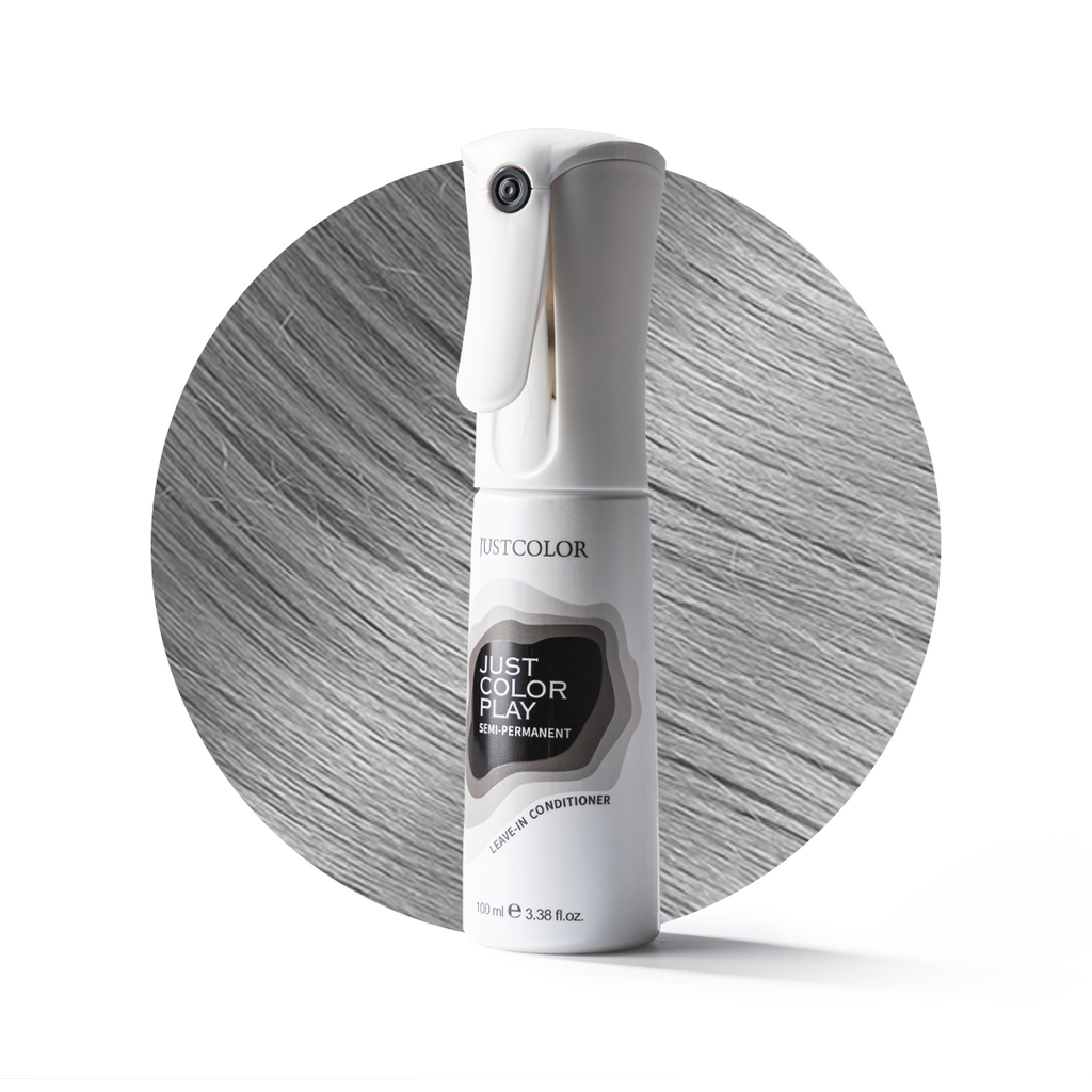 White spray bottle with text on a gray circular background