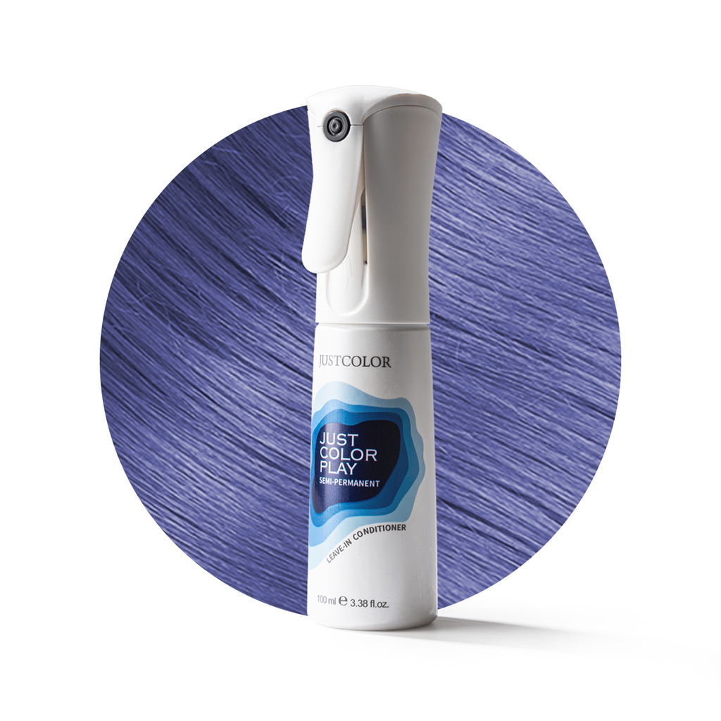 White bottle of Just Color Play hair color conditioner with blue hair strands in the background