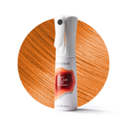 White spray bottle with red label on a wooden background